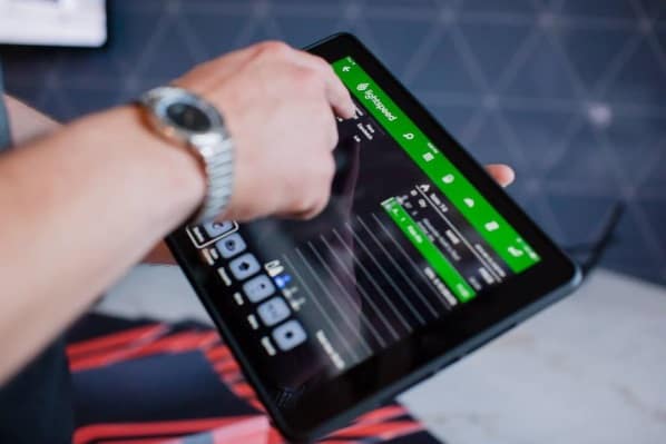a person holding a tablet 
